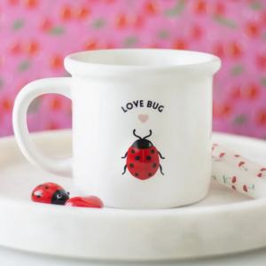 sip your favourite hot drink in style with this adorable love bug ceramic mug. featuring a playful 3d ladybird design and a 'love bug' theme, this white mug is perfect to gift to a loved one or for personal use. not suitable for microwave use and handwash only.